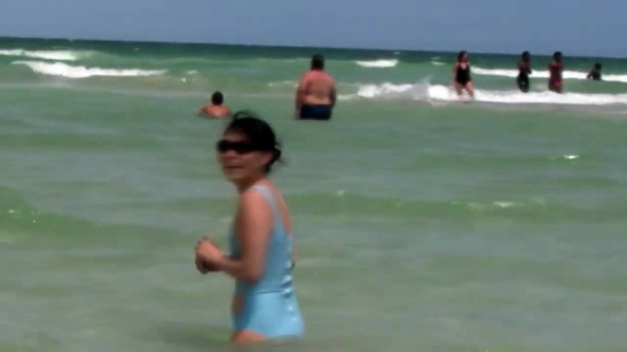 Latex rubber bathing suit public South Beach Miami.