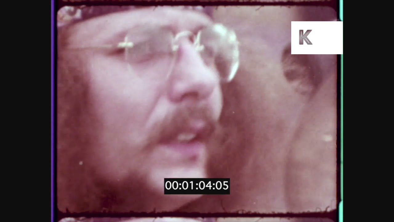 Late 1960s UK, Hippies at Isle of Wight Music Festival, 16mm