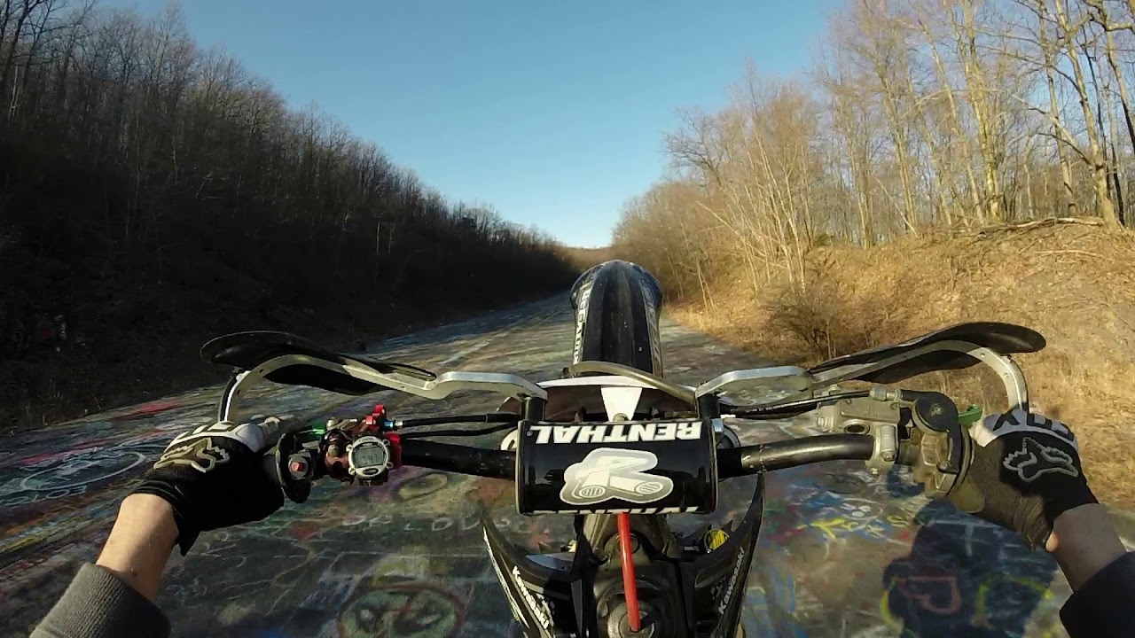 KX 250 2 Stroke Hillclimbs and Wheelies + Guy Tries to Shoot the Drone