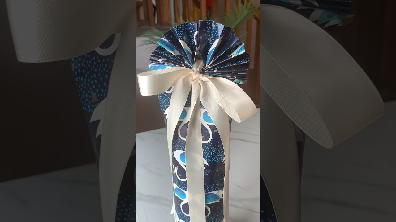How to Wrap a Bottle 🍾#giftwrapping #giftwrappingideas  #giftwrappinghacks #diy #howto #shorts