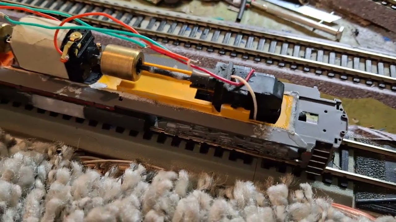 Making a Ho scale Dash 9 chassis with AHM parts for a MTH shell