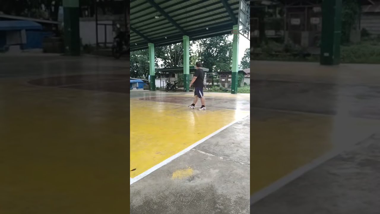 Playing basketball with my cousin 