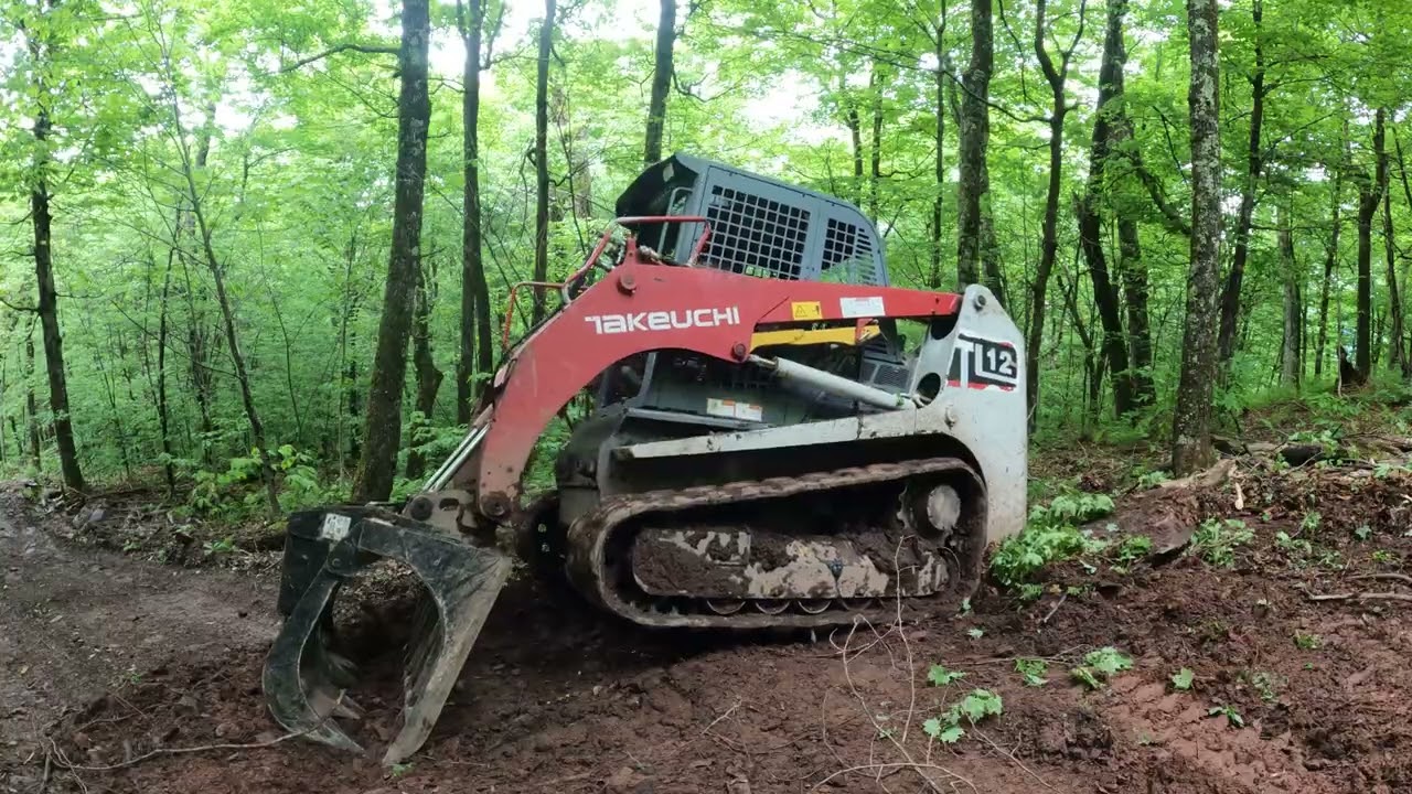 Fixing a track and moving wood.