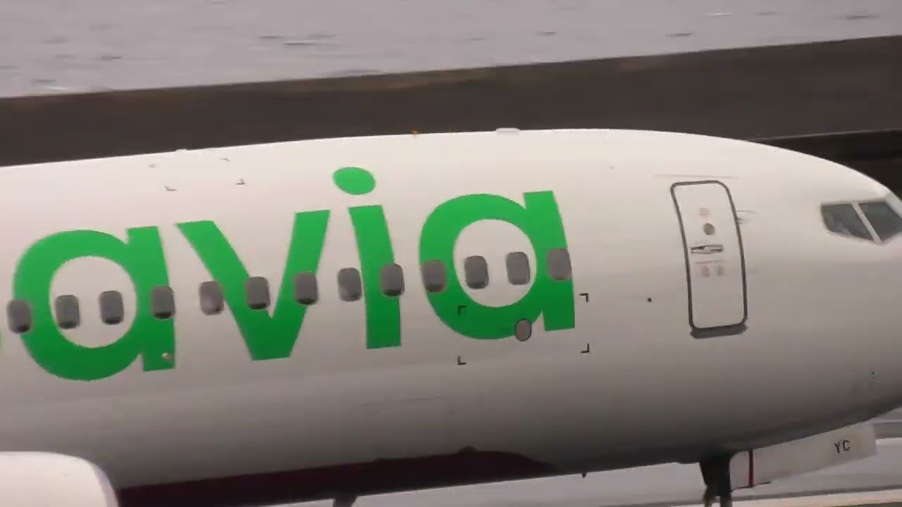 Aterragem do aviao da transavia