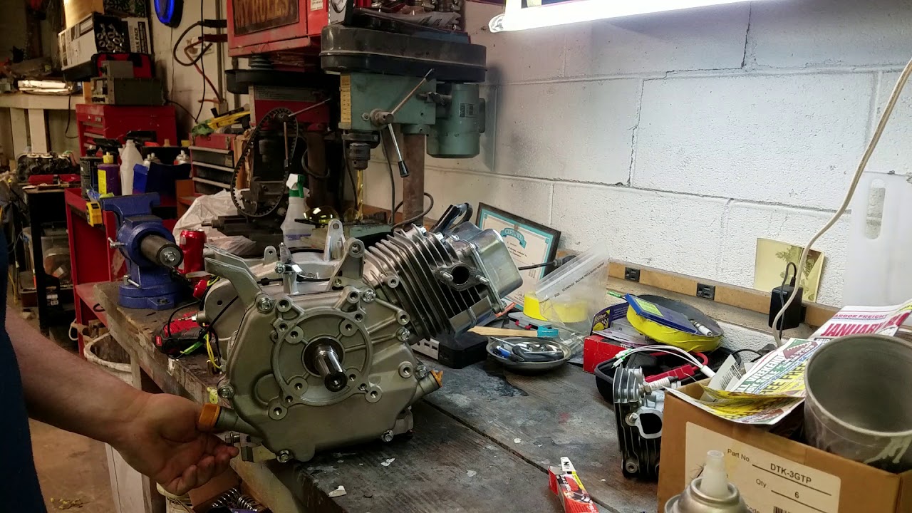 Removing the governor doing a throttle linkage on the Predator 301 and the Autolite racing plug
