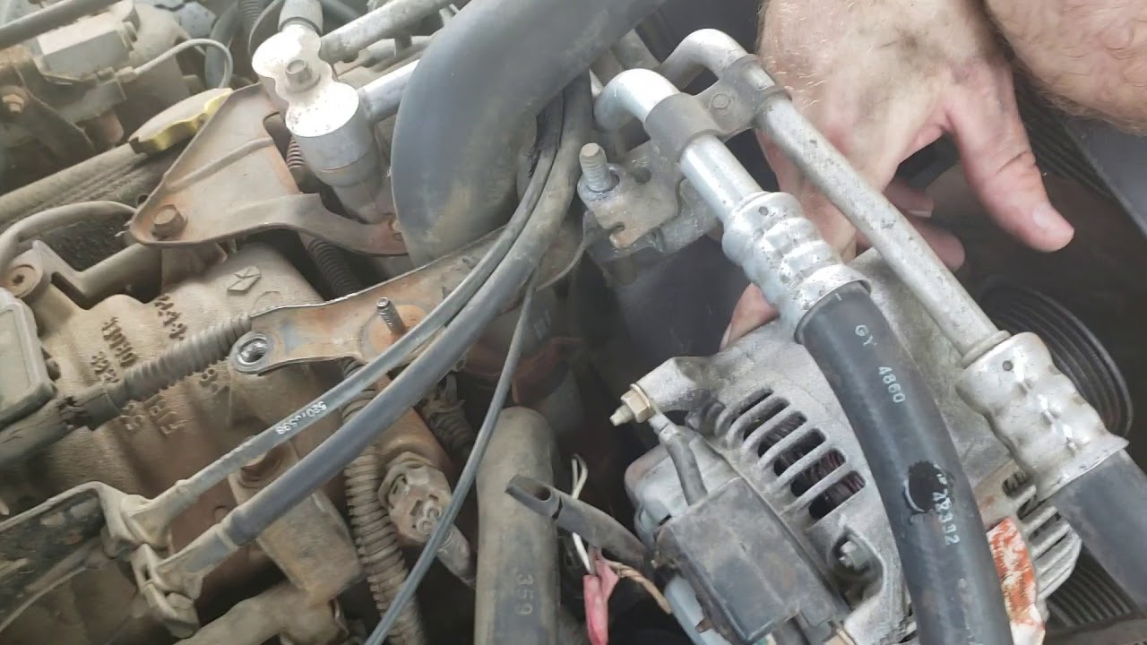 replacing thermostat on 97 dodge ram 2nd gen, thermostat housing, 90 degree coolant hose. part 1