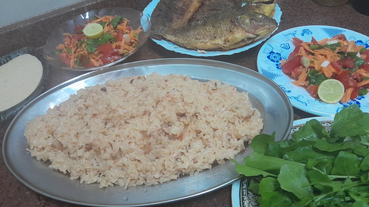 سر تتبيلة السمك 🐟مع رز بالطماطم خطييير👌🐟🐟