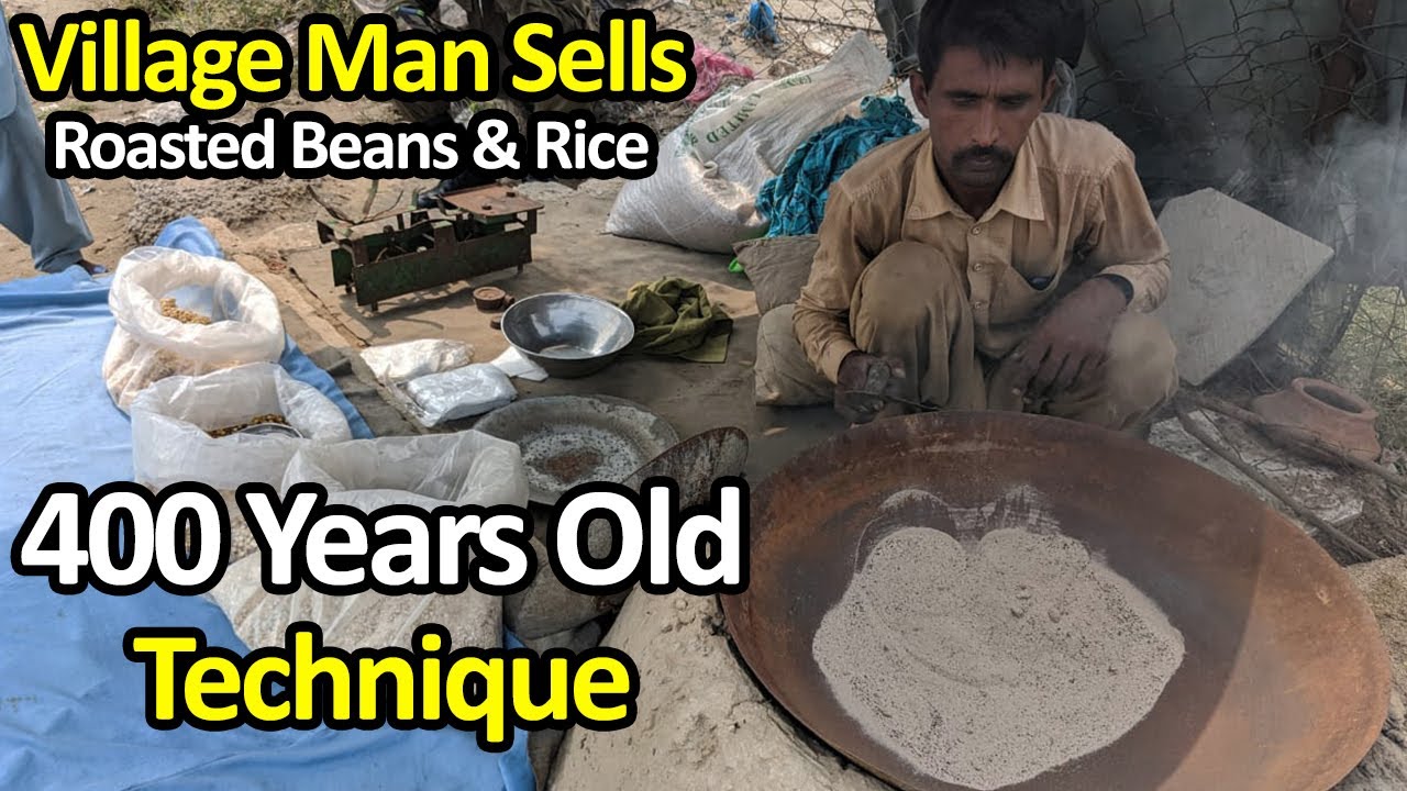 Hardworking man sells roasted beans & rice in an old traditional style - Street food Pakistan