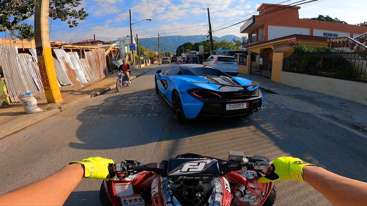 Mclaren 570s vs Cuatrimoto Raptor 700 - Rep. Dom. 🇩🇴