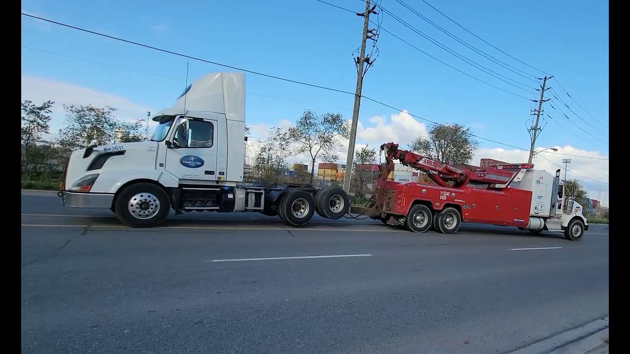 Towing a Truck - Volvo VNL Tractor