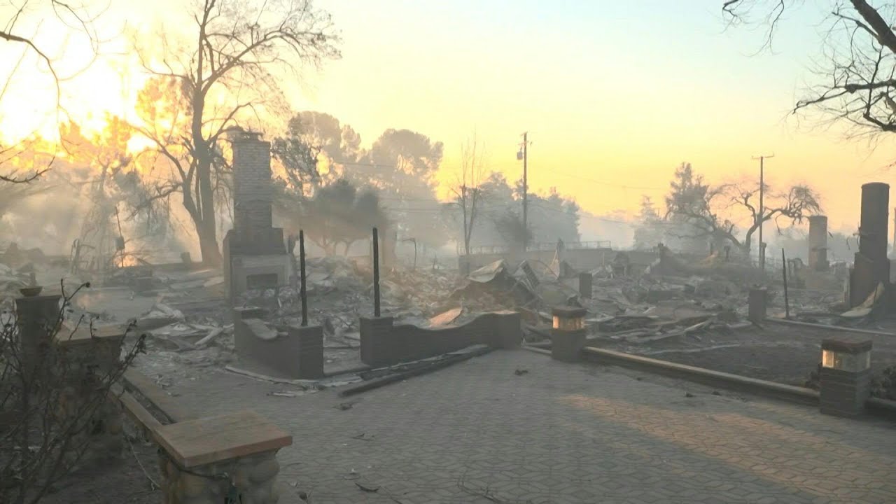 Altadena houses burnt in Los Angeles fires seen at sunrise | AFP