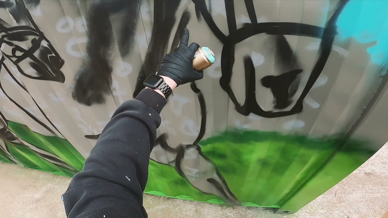 Shipping container transformation with spray paint