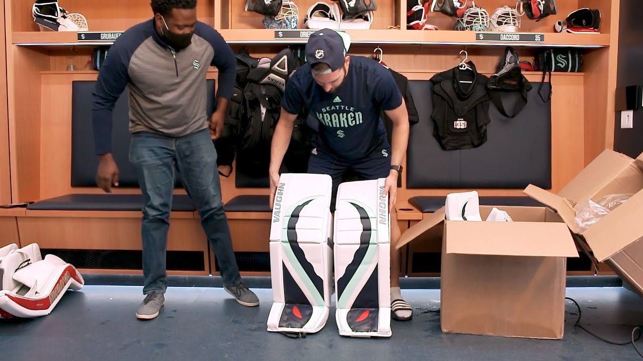 Seattle Kraken goalie Chris Driedger unboxes his new pads