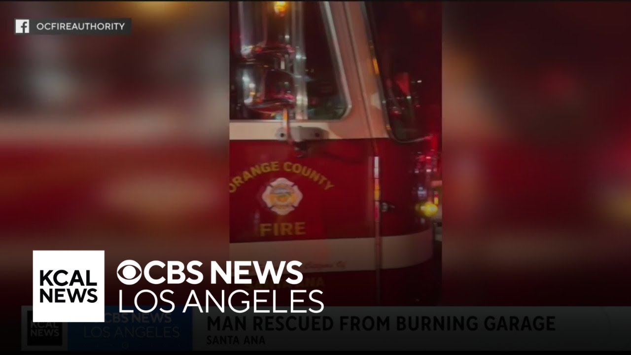 Police rescue man from burning garage in Santa Ana