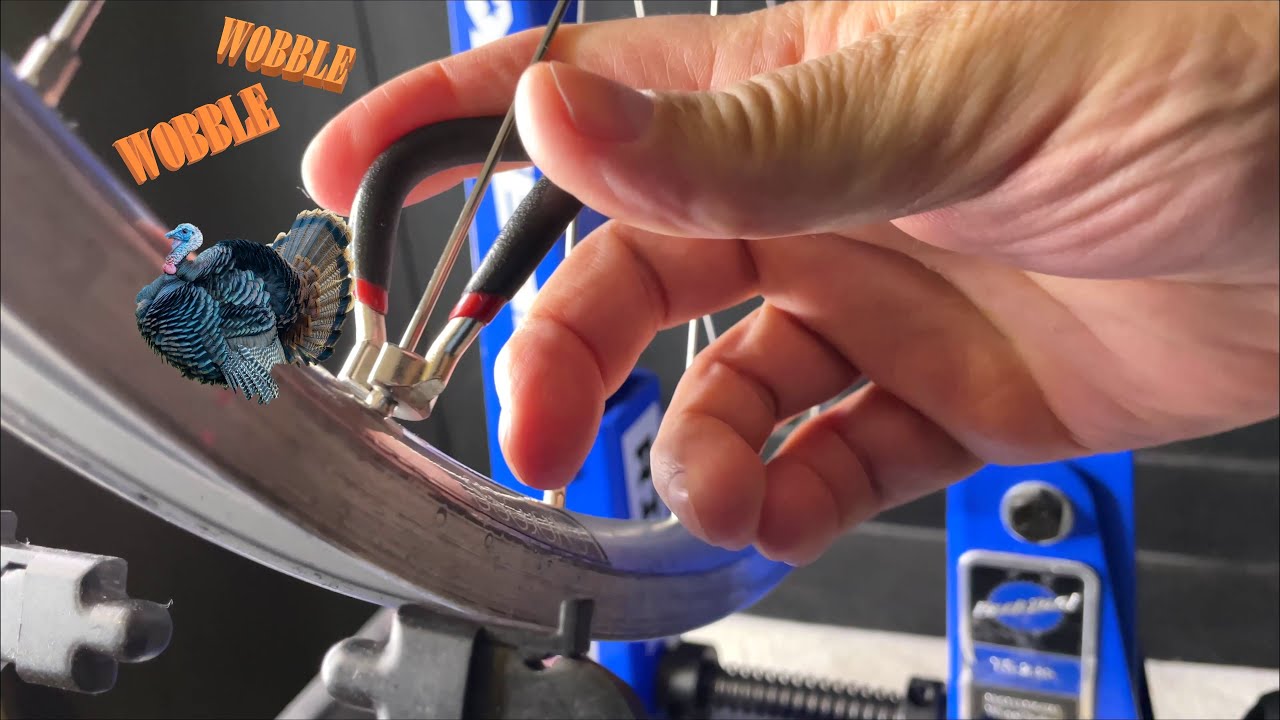 Wobble wobble! Watch me true a wobbly bike wheel!