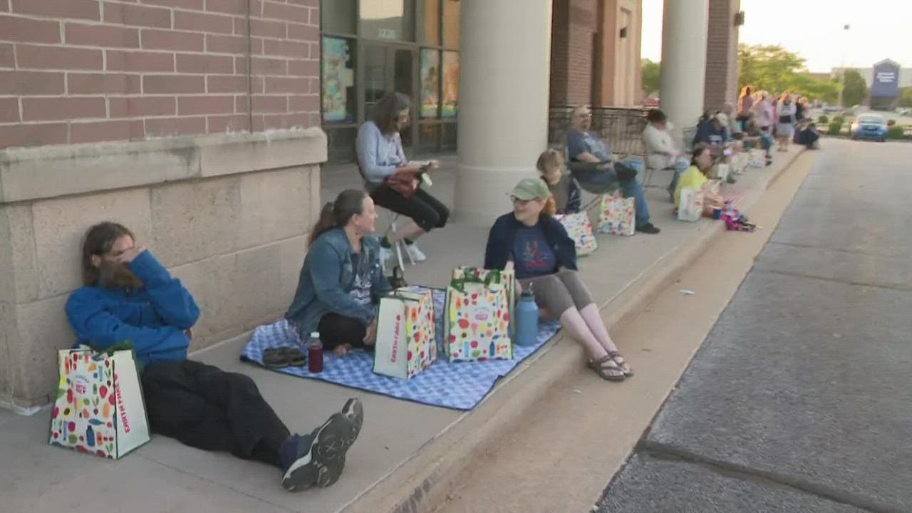 Customers wait for opening of Earth Fare in Fairview Park
