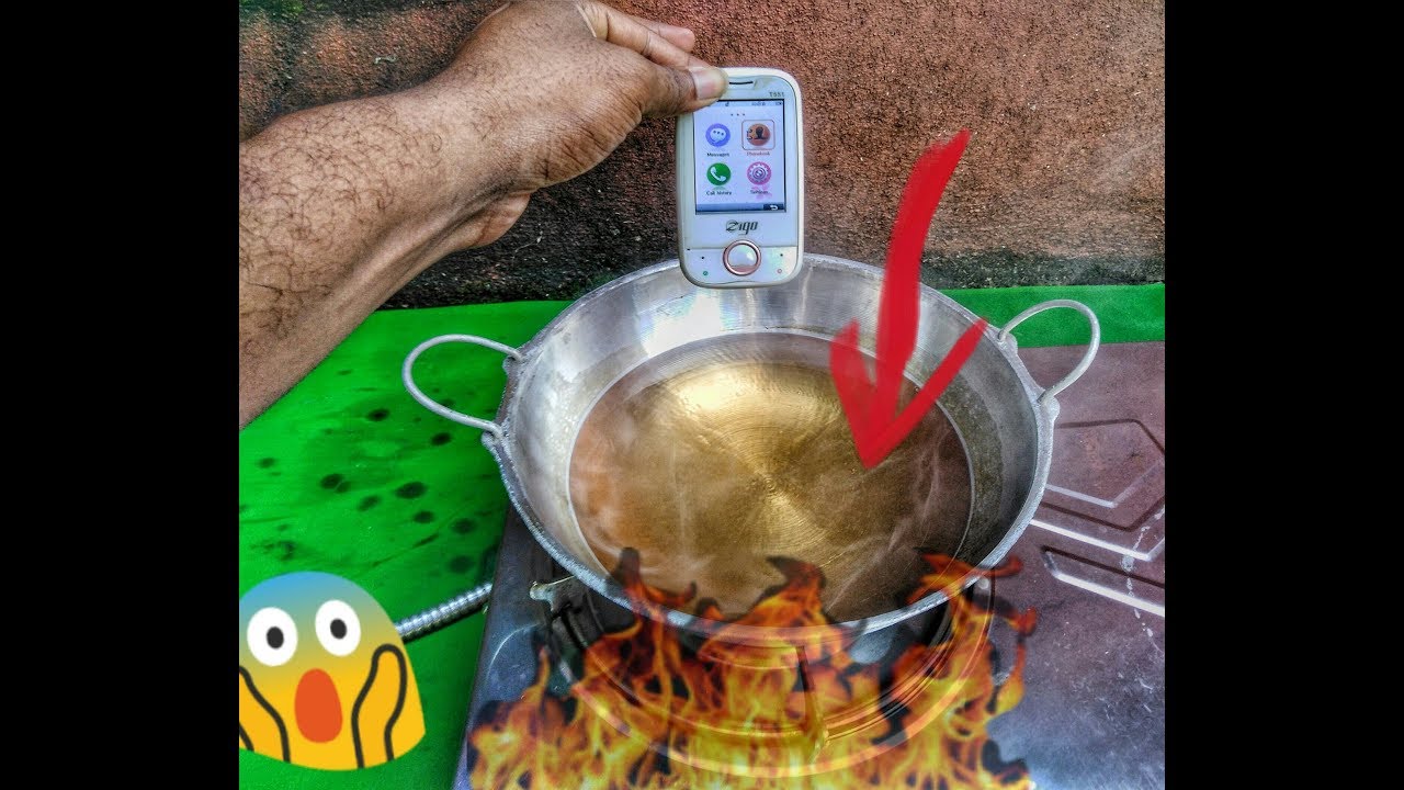 AWESOME REACTION... MOBILE PHONE IN HOT OIL