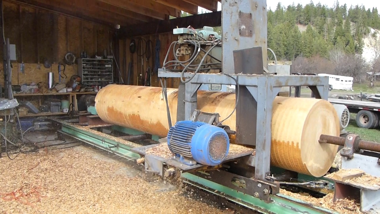 Steve Bachman turning huge Larch sawing log