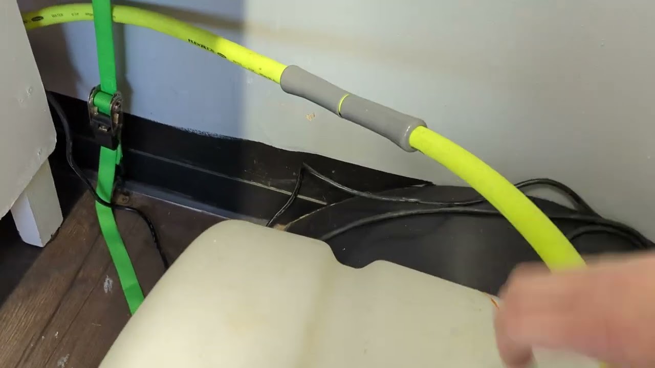 easy water solution for a dog grooming bathtub