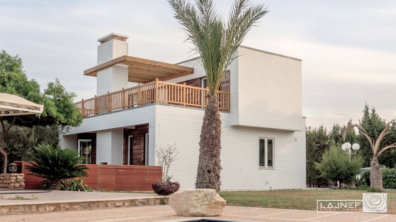 Levage d'une maison en bois - les 4 vents