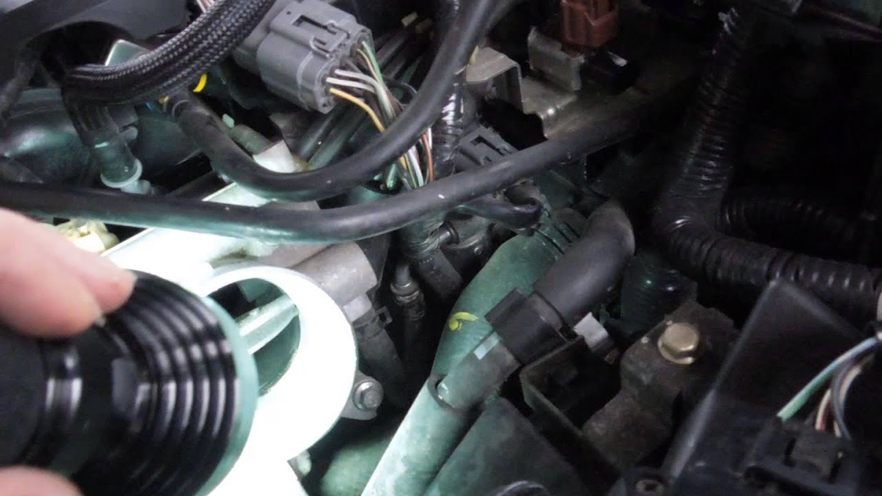 how to clean throttle body on mazda 3 2006