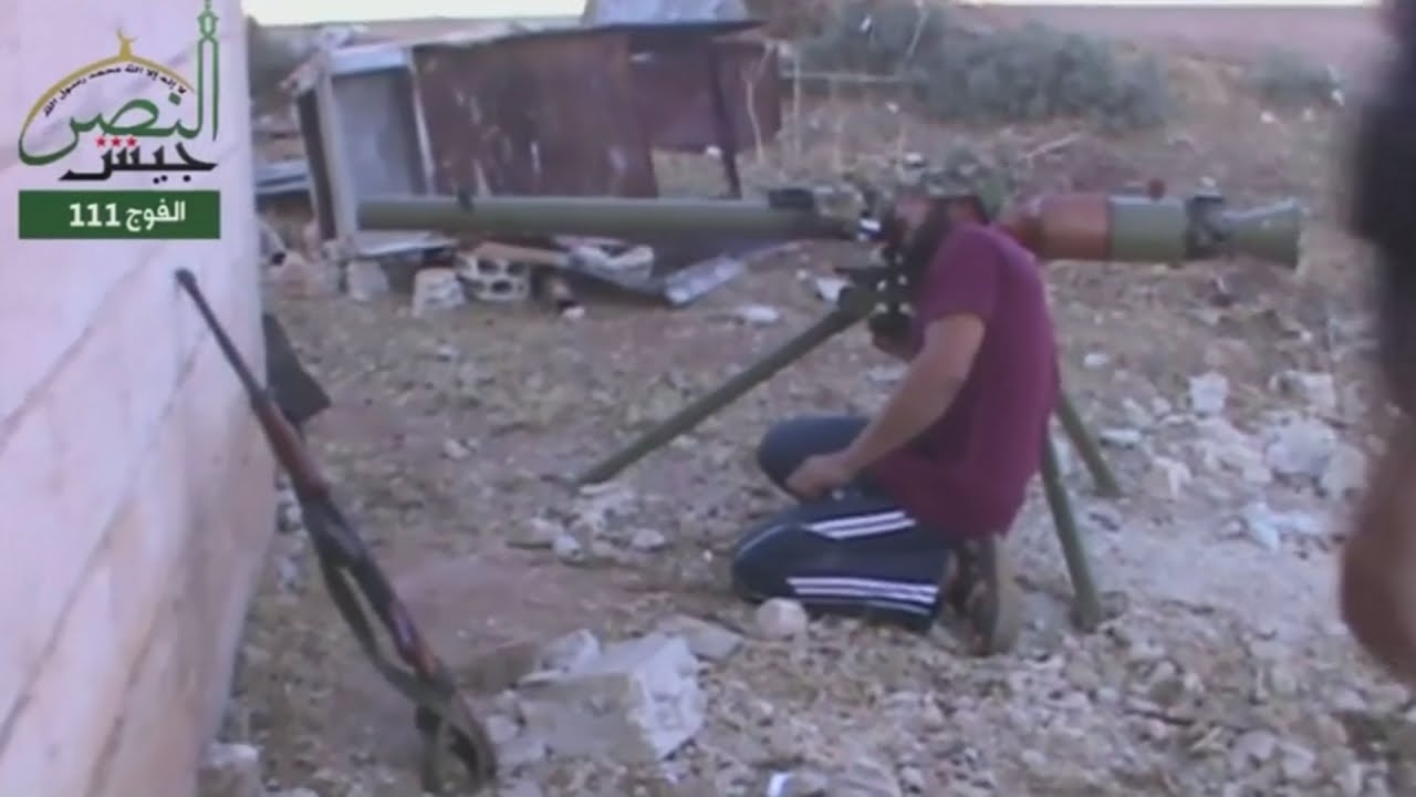Syrian rebel fighters reportedly firing at government troops in Hama