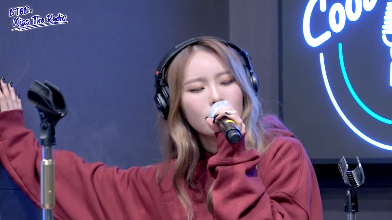Just Monday serving vocals in a live radio karaoke segment