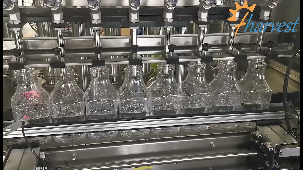 Machine de remplissage multi-t&ecirc;tes, machine de remplissage de liquide automatique
