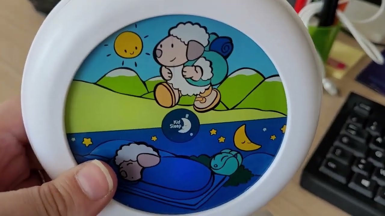 Guide explicatif - r&eacute;glage heure et alarme Kid'sleep Globetrotter - Pabobo