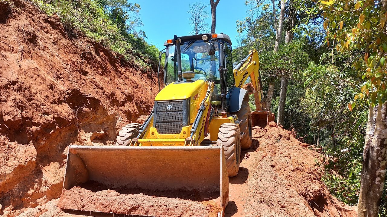 RETROESCAVADEIRA NEW HOLLAND B95B ABRINDO ESTRADA. #newhollandtractor #extremo #estrada