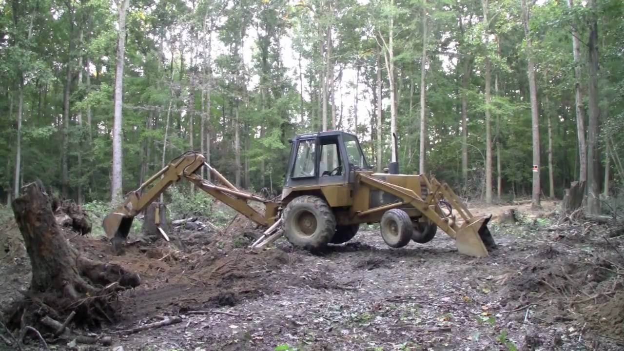 Case 580C Backhoe - Digging out three big stumps - Part 2 (HD)