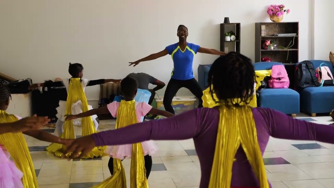 CHILDREN PRACTISING WINGS