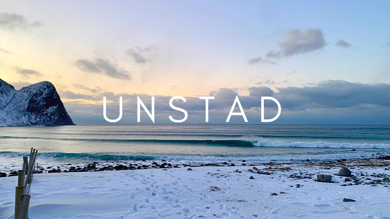 Surfing the freezing waters of Unstad, Lofoten, Norway