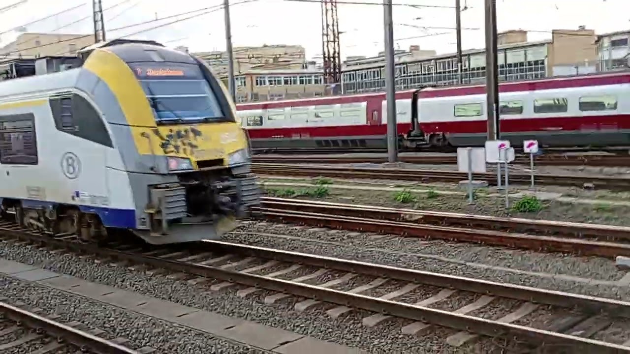 Eurostar red and S3 departing out of Brussels South 