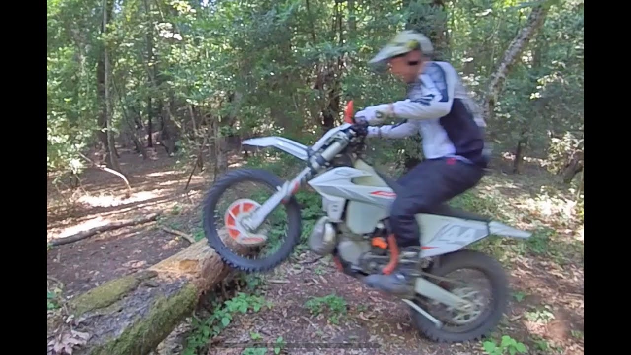The Double blip technique to ride over logs.  Trials skills
