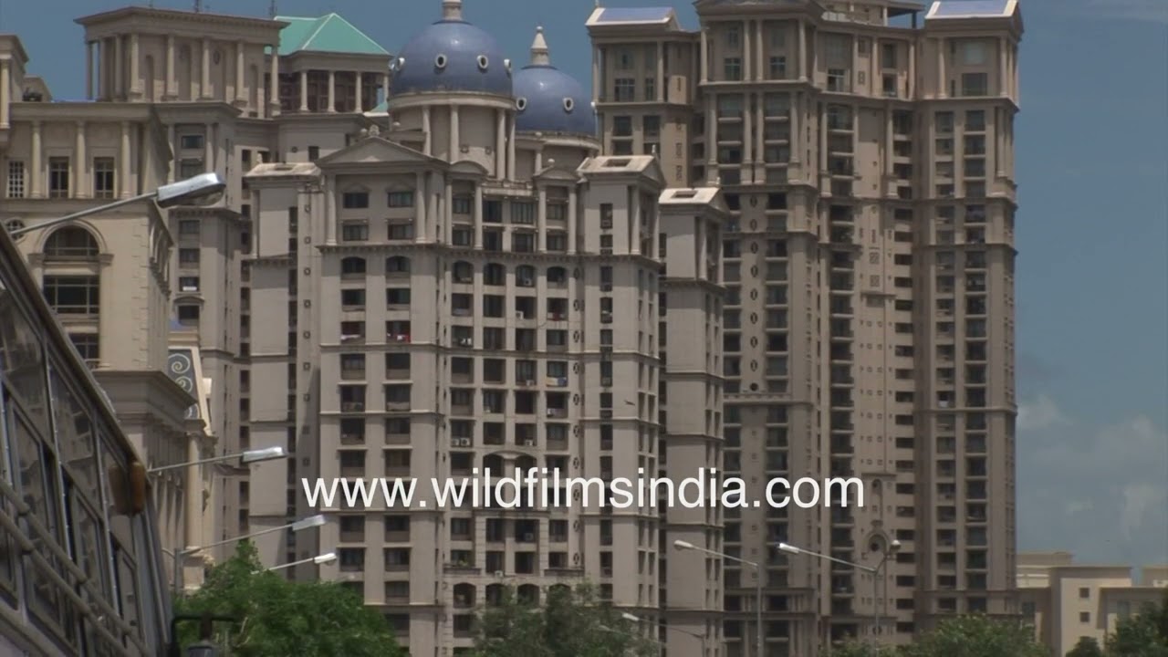 Mumbai as seen circa 2004  Powai slum surrounded by luxury villas, Hiranandani Hospital