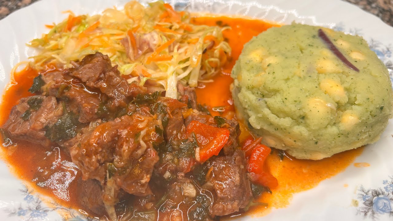 Mukimo / mashed potatoes with pumpkin leaves and maize