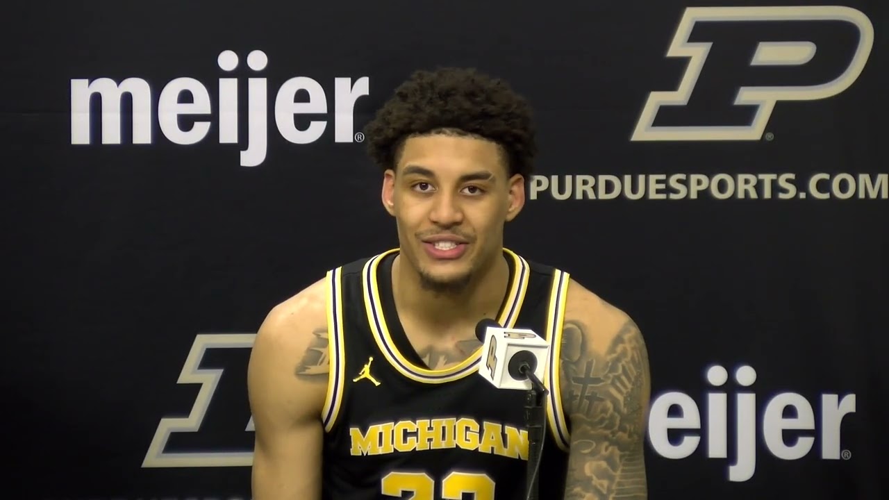 Michigan's Elliot Cadeau, left, and Yaxel Lendeborg on 91-80 win over Purdue