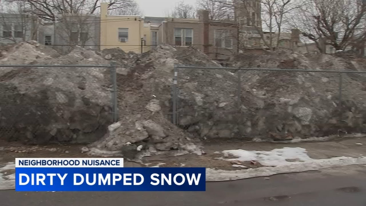 Massive snow pile in vacant lot sparks concerns:  'Praying that it doesn't rain heavy'