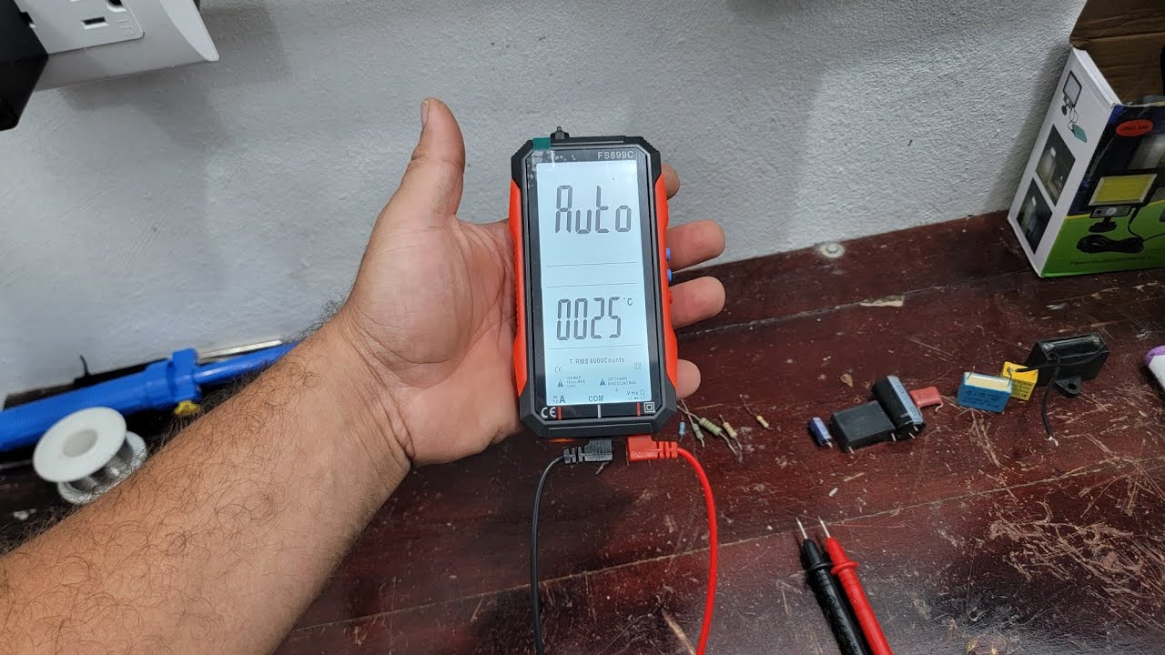 multímetro recargable automático FS899C
