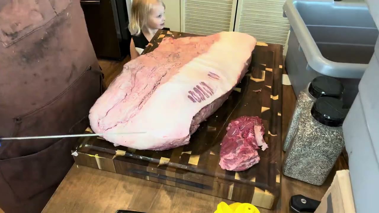 Trimming brisket and splitting one! 