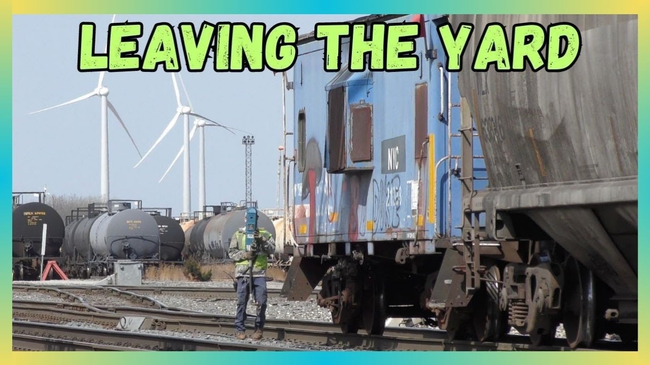 Local train gets ready to leave the yard after a Grain train crosses the diamonds. 