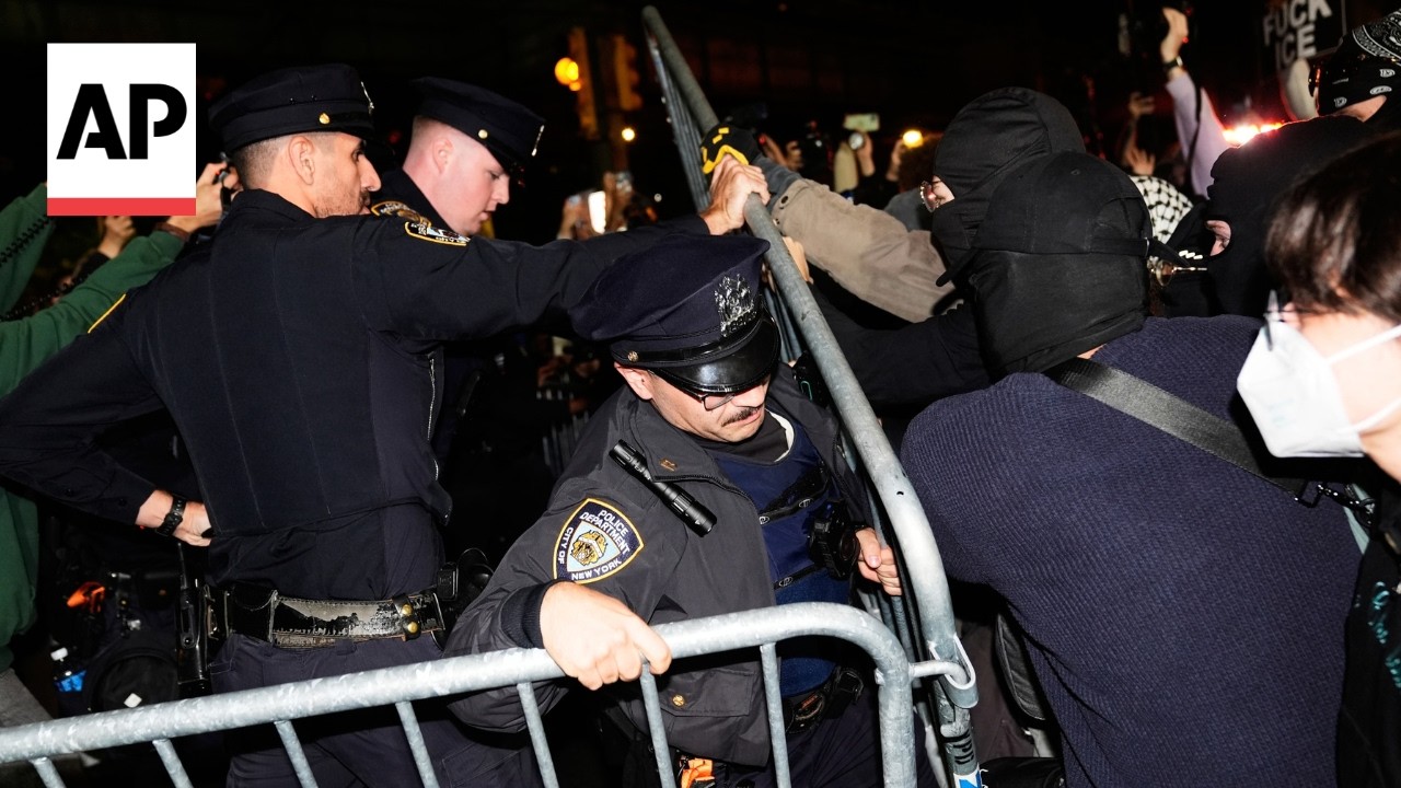 Protesters scuffle with police in New York after ICE officer shoots a man