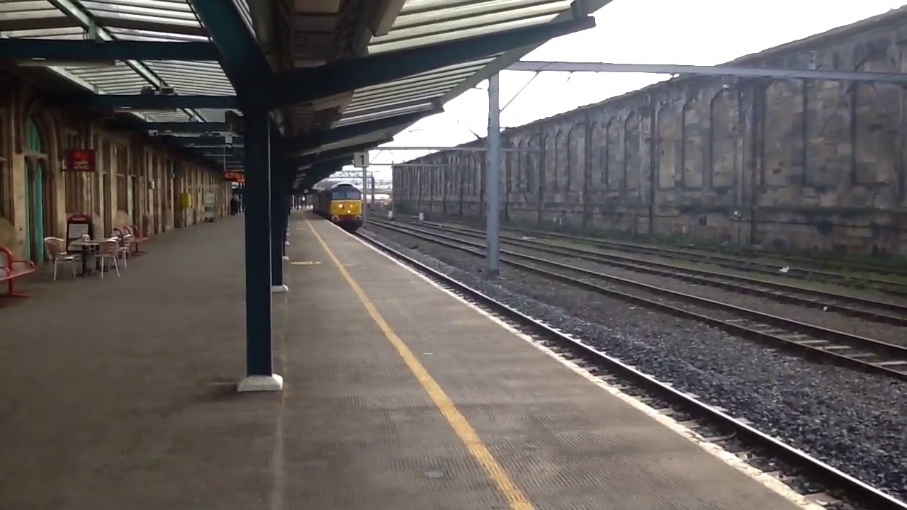 DRS' 57007 leads 57004 though Carlisle on 6C18 Crewe to Carlisle yard