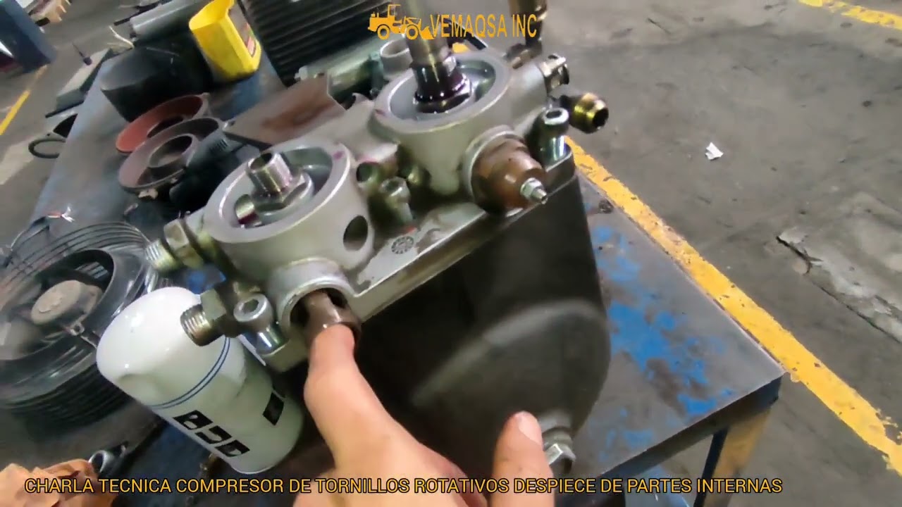 CHARLA TECNICA. COMPRESOR DE TORNILLOS ROTATIVOS. DESPIECE DE PARTES INTERNAS.