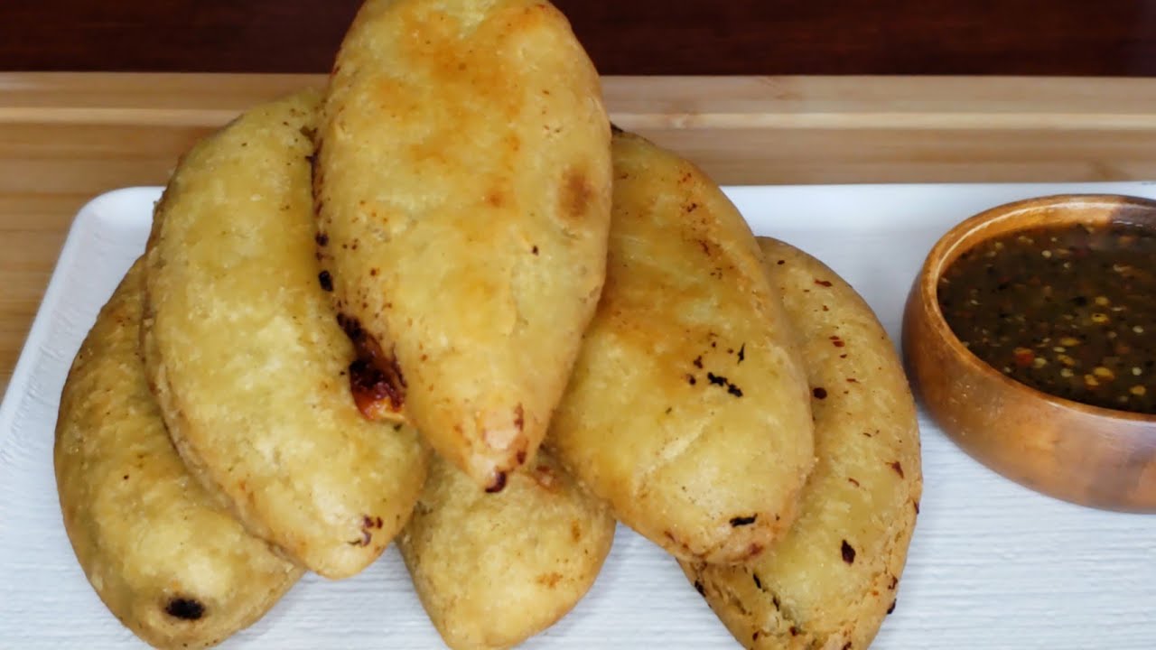 Chiles Jalapeños Rellenos y envueltos en Masa