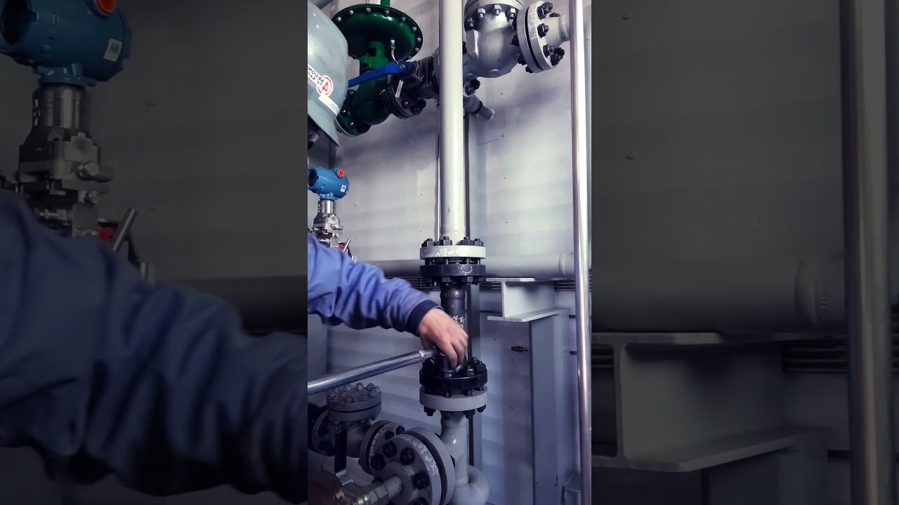 Pipefitting custom oil and gas processing equipment.