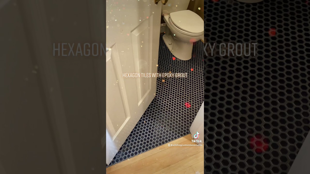 Mosaic floor tiles installed with stain resistant grout