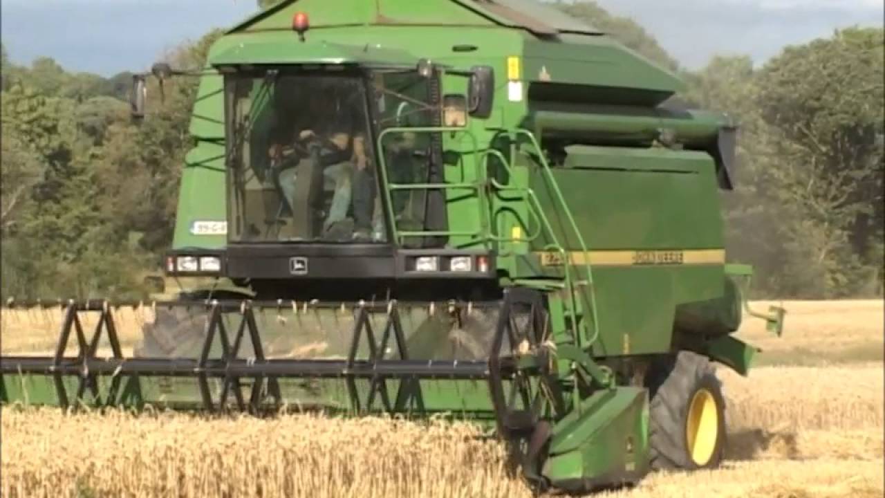 John Deere T670i and 2258 combines