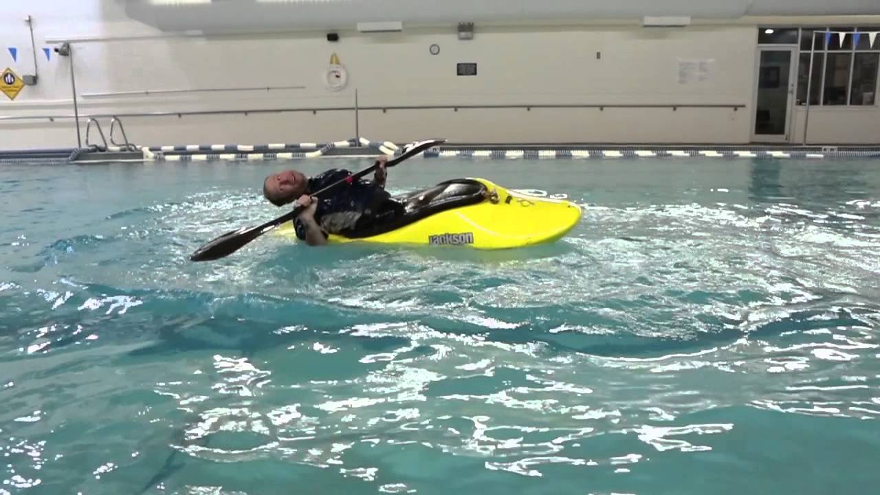 learn how to back deck roll a kayak